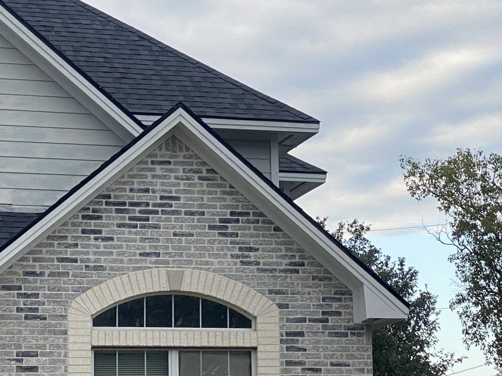 Slide of Big Randys Roofing