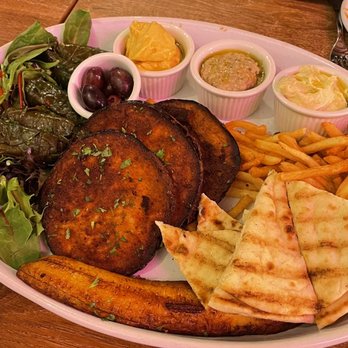 Nzuko Restaurant - Vegan Delight Platter, with Crispy Eggplant, Pita, Hummus Spread, Plantains, and Grape Leaves - Caribbean Near Me - Watertown, Massachusetts Nzuko Restaurant - Vegan Delight Platter, with Crispy Eggplant, Pita, Hummus Spread, Plantains, and Grape Leaves - Caribbean Near Me - Watertown, Massachusetts