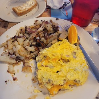 Ronnie's Cafe - Meatlovers omelette, this is half eaten portions are big!! I love this place more because of the atmosphere. It's just home cooking. - Breakfast & Brunch Near Me - Glendale, Arizona Ronnie's Cafe - Meatlovers omelette, this is half eaten portions are big!! I love this place more because of the atmosphere. It's just home cooking. - Breakfast & Brunch Near Me - Glendale, Arizona
