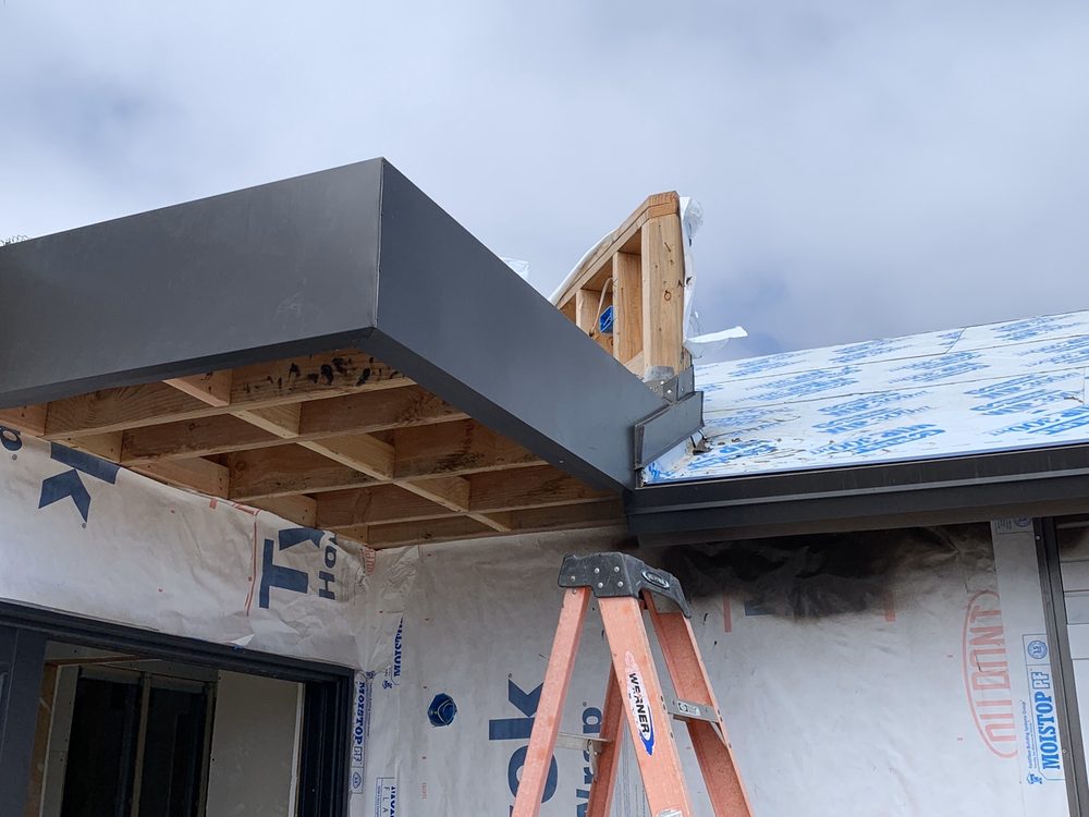 Slide of Regan Roofing