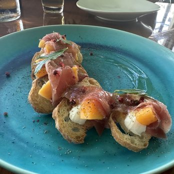 Rigo - Prosciutto with melon and bread - Spanish Near Me - Honolulu, Hawaii Rigo - Prosciutto with melon and bread - Spanish Near Me - Honolulu, Hawaii