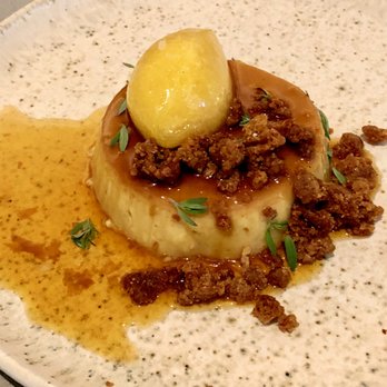 Suerte - If You Got It Flan It duck egg cashew custard topped with molasses crumble and apricot orange sorbet - Mexican Near Me - Austin, Texas Suerte - If You Got It Flan It duck egg cashew custard topped with molasses crumble and apricot orange sorbet - Mexican Near Me - Austin, Texas