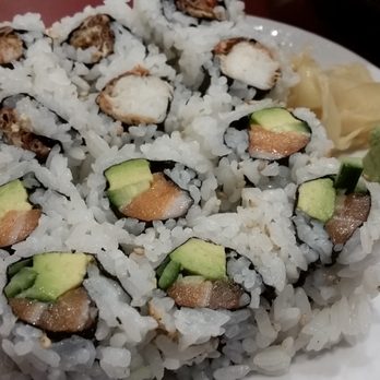 Ajishin - Softshell crab roll and a salmon/avocado/cucumber roll. - Sushi Bars Near Me - Novi, Michigan Ajishin - Softshell crab roll and a salmon/avocado/cucumber roll. - Sushi Bars Near Me - Novi, Michigan