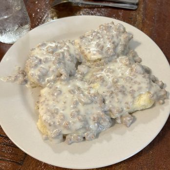 Eva's On Main - Biscuit smothered in sausage gravy - Southern Near Me - Summerville, South Carolina