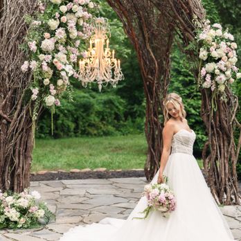 Ramble Creek Vineyard & Events - The Vine Arbor in full dress. Blush florals, crystal chandelier, and a stone path. Athens, TN garden wedding outdoor ceremony site in June. - Venues & Event Spaces Near Me - Athens, Tennessee Ramble Creek Vineyard & Events - The Vine Arbor in full dress. Blush florals, crystal chandelier, and a stone path. Athens, TN garden wedding outdoor ceremony site in June. - Venues & Event Spaces Near Me - Athens, Tennessee