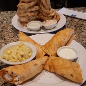 Cheddar's Scratch Kitchen - Buffalo chicken wrap with Mac and cheese and the onion rings appetizer - American Near Me - Terre Haute, Indiana