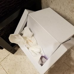 Quy M Phan, DMD - Dental Care at Avalon Park - Smeared bloody tissues overflowing the tampons box