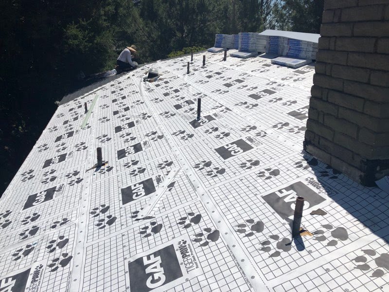 Slide of JW Roofing Services