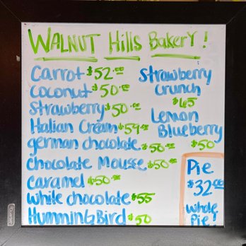 Walnut Hills - Sign, revealing the cost of cakes - Southern Near Me - Vicksburg, Mississippi