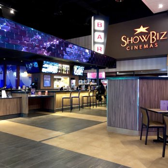 Showbiz Cinemas Edmond - The adult beverages area. They sell liquor & have quite a collection of beer handles, too. February 2019 - Cinema Near Me - Edmond, Oklahoma Showbiz Cinemas Edmond - The adult beverages area. They sell liquor & have quite a collection of beer handles, too. February 2019 - Cinema Near Me - Edmond, Oklahoma