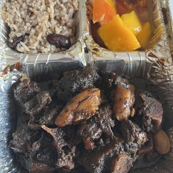 One Love Island Cuisine - Oxtail Bowl with rice and mango salad.  Deep, rich beef flavor.  Very nice. - Caribbean Near Me - Oceanside, California