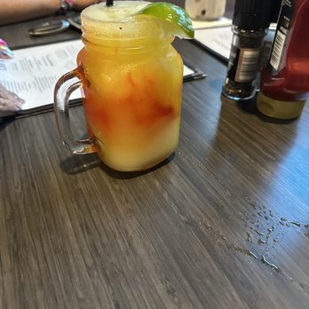 Blake's Kitchen & Kocktailz - Frozen mango and strawberry margarita - New American Near Me - Columbus, Texas