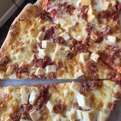Chicken,  bacon,  half red sauce,  half white sauce.