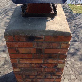 Pfleger Masonry - Rebuilt the top with brick We saved from a previous repair. New concrete crown installed around the flue - Masonry/Concrete Near Me - Arlington, Texas Pfleger Masonry - Rebuilt the top with brick We saved from a previous repair. New concrete crown installed around the flue - Masonry/Concrete Near Me - Arlington, Texas