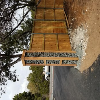 Neely Brothers - Gabion Column with 8 Foot cedar fence - pic oriented wrong - Irrigation Near Me - Liberty Hill, Texas Neely Brothers - Gabion Column with 8 Foot cedar fence - pic oriented wrong - Irrigation Near Me - Liberty Hill, Texas