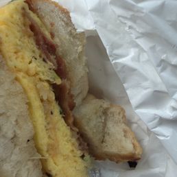 It's supposed to be a delicious breakfast sandwich with egg and cheddar and bacon, but I am pretty sure cardboard would taste better. It's supposed to be a delicious breakfast sandwich with egg and cheddar and bacon, but I am pretty sure cardboard would taste better.