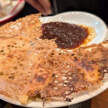 Ramen Nagi - Gyoza with skirt, very good. Skin was super crispy like a potato chip. - Ramen Near Me - Santa Clara, California Ramen Nagi - Gyoza with skirt, very good. Skin was super crispy like a potato chip. - Ramen Near Me - Santa Clara, California