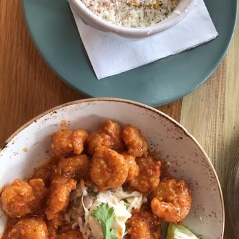 Babalu - Mexican street corn and their spin on bang bang shrimp. - Tapas/Small Plates Near Me - Memphis, Tennessee Babalu - Mexican street corn and their spin on bang bang shrimp. - Tapas/Small Plates Near Me - Memphis, Tennessee