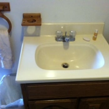 Colonial Inn - Bathroom sink with soap and shampoo - Hotels Near Me - Portageville, New York Colonial Inn - Bathroom sink with soap and shampoo - Hotels Near Me - Portageville, New York