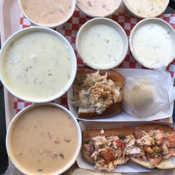 Pike Place Chowder - The four cup sampler, a medium seafood bisque, a large New New England Clam Chowder, a full lobster roll and a half Dungeness Crab Roll. - Seafood Near Me - Seattle, Washington Pike Place Chowder - The four cup sampler, a medium seafood bisque, a large New New England Clam Chowder, a full lobster roll and a half Dungeness Crab Roll. - Seafood Near Me - Seattle, Washington