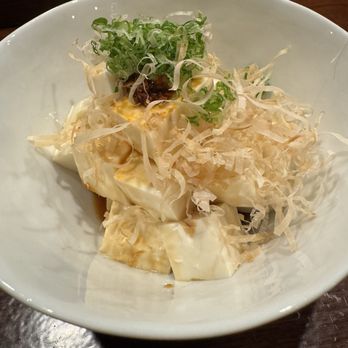 Nagisa Sushi - Hiya yakko soft tofu with bonito flakes, shoyu, green onion and chili crunch - Sushi Bars Near Me - San Diego, California Nagisa Sushi - Hiya yakko soft tofu with bonito flakes, shoyu, green onion and chili crunch - Sushi Bars Near Me - San Diego, California