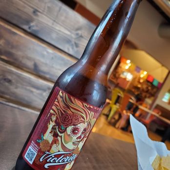 El Mezcal - a bottle of beer and chips - Mexican Near Me - Stevens Point, Wisconsin