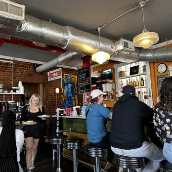 821 Café - people sitting at the bar - New American Near Me - Richmond, Virginia 821 Café - people sitting at the bar - New American Near Me - Richmond, Virginia