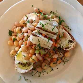 Naked Dog - Grilled octopus - goat cheese - bean crostini - Italian Near Me - Brooklyn, New York Naked Dog - Grilled octopus - goat cheese - bean crostini - Italian Near Me - Brooklyn, New York