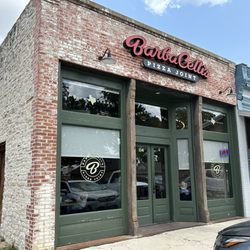Barbacellis - Great updating to a historic building, preserving the stone wall inside and the brick with wrought iron supports out front.