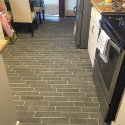 Italian gray tile for the kitchen to bring out the countertops. Italian gray tile for the kitchen to bring out the countertops.