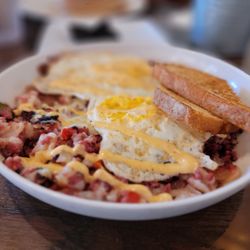 Nutmeg Bakery & Cafe - Spicy corned beef hash (not spicy) but So Good!
