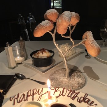 Steak 44 - Beignets with vanilla and chocolate dipping sauce. Great artistic presentation! - Steakhouses Near Me - Phoenix, Arizona Steak 44 - Beignets with vanilla and chocolate dipping sauce. Great artistic presentation! - Steakhouses Near Me - Phoenix, Arizona