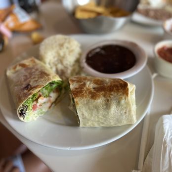 Tequila’s Town - My friend's meal - an avocado/shrimp burrito with rice and black beans. - Tex-Mex Near Me - Jacksonville, Florida Tequila’s Town - My friend's meal - an avocado/shrimp burrito with rice and black beans. - Tex-Mex Near Me - Jacksonville, Florida