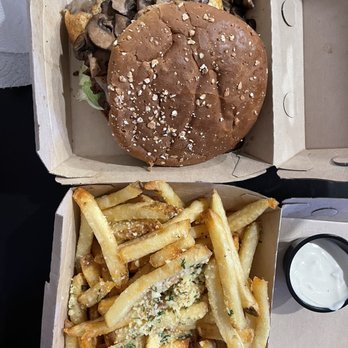 Islands Restaurant - Maui mushroom burger with egg and truffle fries. Delicious burger and fries combo! - Burgers Near Me - Pasadena, California