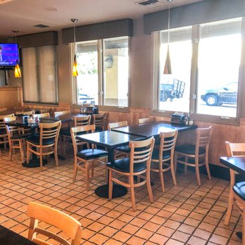 Round Table Pizza - Plenty of light and table seating - Pizza Near Me - San Rafael, California Round Table Pizza - Plenty of light and table seating - Pizza Near Me - San Rafael, California