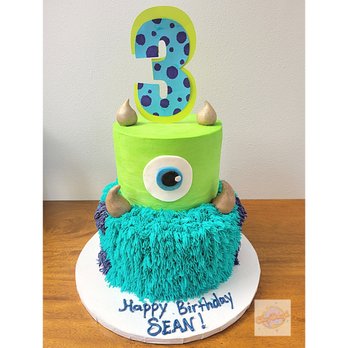 Chey'Dough - 2 tiered red velvet & vanilla cake Monster's Inc theme - Custom Cakes Near Me
