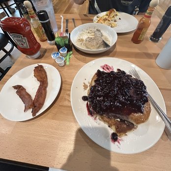 Mountain Breakfast - Blueberry pancakes, bacon, biscuit gravy and eggs Benedict. - Breakfast & Brunch Near Me - Gatlinburg, Tennessee Mountain Breakfast - Blueberry pancakes, bacon, biscuit gravy and eggs Benedict. - Breakfast & Brunch Near Me - Gatlinburg, Tennessee