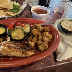 Front Street Junction - Blackened Catfish with Steamed Vegetables and Fried Okra. Side Cajun Shrimp Sauce and a Chips and Salsa appetizer.