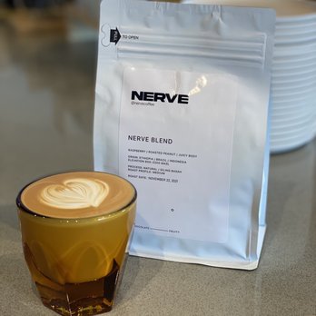Nerve Coffee - a bag of nerve next to a cup of coffee - Cafes Near Me - Brownsville, Texas