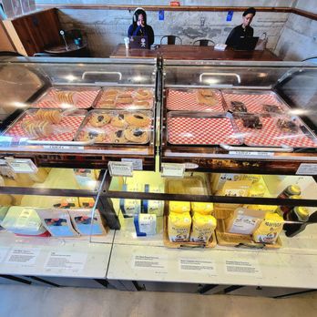 Cafe June - Dessert display and bags of coffee underneath. - Coffee & Tea Near Me - Ellicott City, Maryland Cafe June - Dessert display and bags of coffee underneath. - Coffee & Tea Near Me - Ellicott City, Maryland