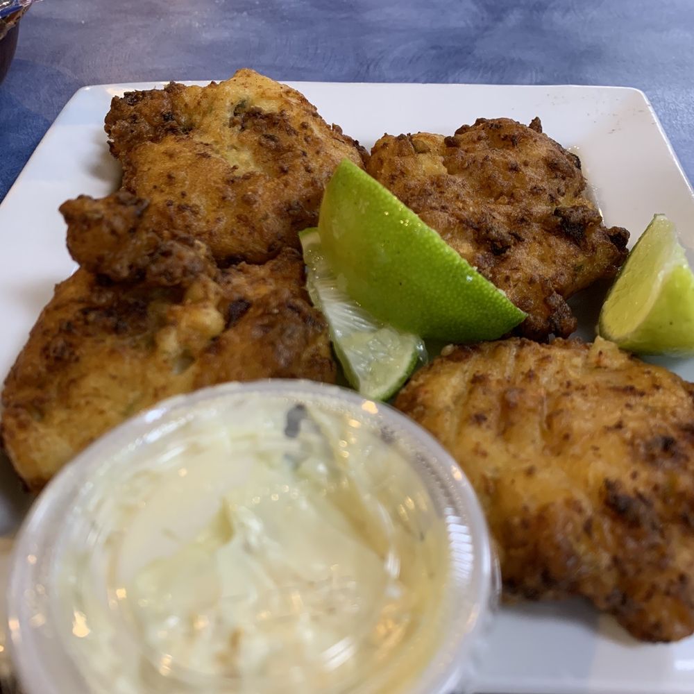 Bahamas Fish Market - Their delicious conch fritters ( sold individually ) - Seafood Markets Near Me - West Miami, Florida Bahamas Fish Market - Their delicious conch fritters ( sold individually ) - Seafood Markets Near Me - West Miami, Florida