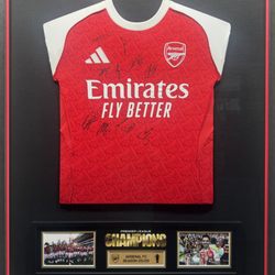 Artistic Picture Framing - Premium custom jersey frame with an inside frame for the championship plaque and photos.
