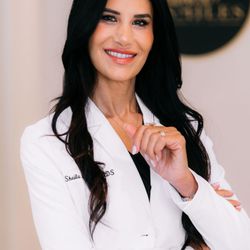 Signature Smiles - Dr. Mahooti treats every patient as she would her family members.