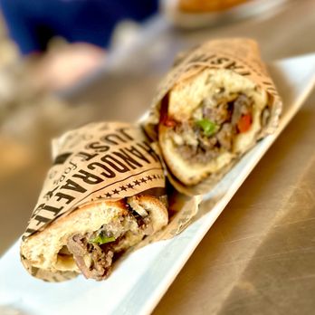 Southside Pizza & Pub - two burritos on a plate - Pizza Near Me - Columbia, Missouri Southside Pizza & Pub - two burritos on a plate - Pizza Near Me - Columbia, Missouri