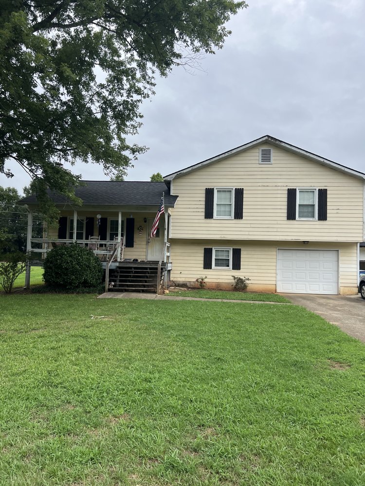 Slide of Optimum Roofing