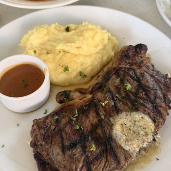 Dapper Dine & Lounge - Ribeye with Garlic mashed potatoes - Cocktail Bars Near Me - Riverside, California Dapper Dine & Lounge - Ribeye with Garlic mashed potatoes - Cocktail Bars Near Me - Riverside, California