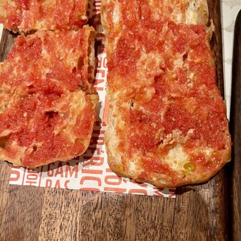 Jaleo - Pan con tomate - just toasted bread brushed with tomato - Spanish Near Me - Las Vegas, Nevada Jaleo - Pan con tomate - just toasted bread brushed with tomato - Spanish Near Me - Las Vegas, Nevada
