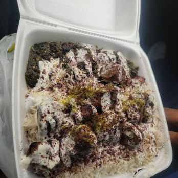 Kebabs To Go! - Beff and Lamb over rice and spinach Taken 04.27.23 - Mediterranean Near Me - Irving, Texas Kebabs To Go! - Beff and Lamb over rice and spinach Taken 04.27.23 - Mediterranean Near Me - Irving, Texas