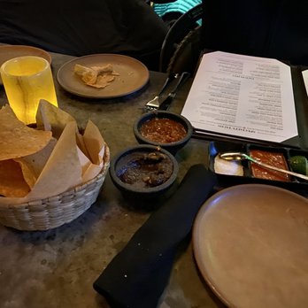 SOL Mexican Cocina - What you recieve when seated (chips, salsa, black beans, hot sauce, salt, and limes - Bars Near Me - Denver, Colorado