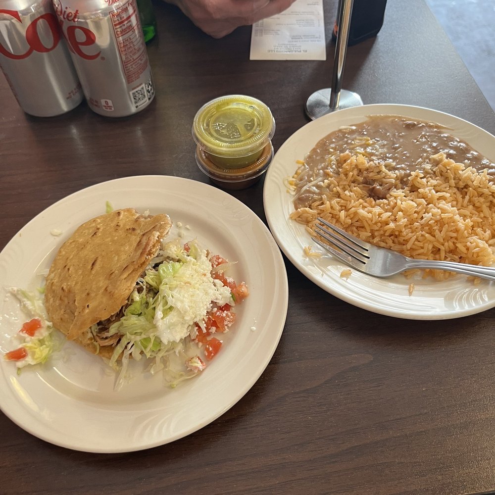 Carnitas Gordita rice and beans on the side Carnitas Gordita rice and beans on the side